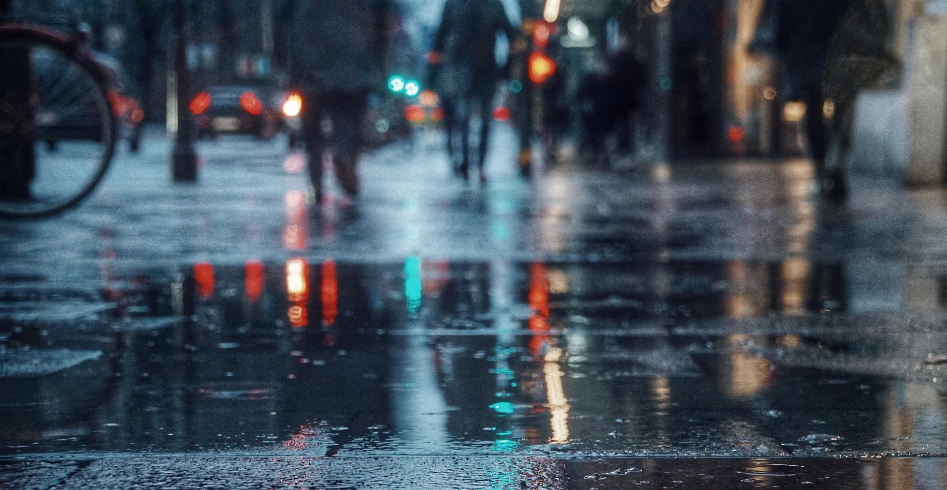 Wet pavement during night