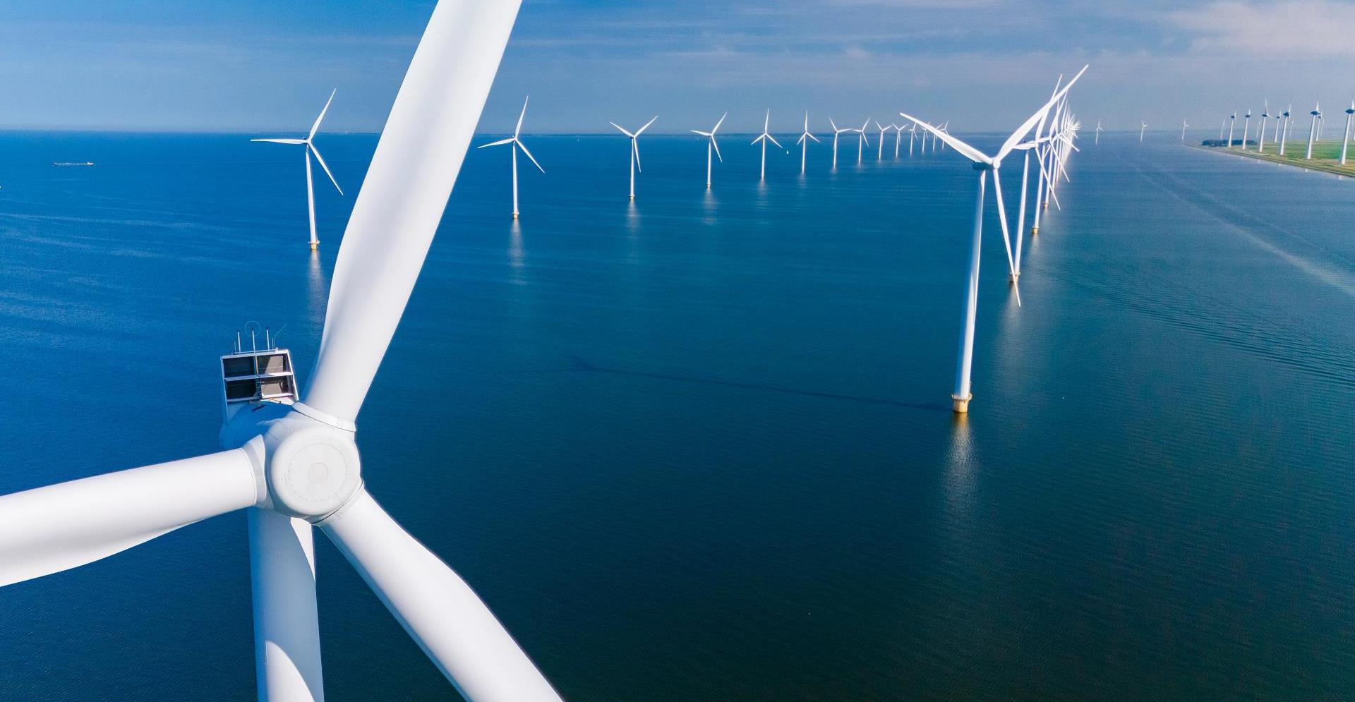 Green Energy Revolution With Wind Turbines in the Netherlands Under Clear Blue Skies