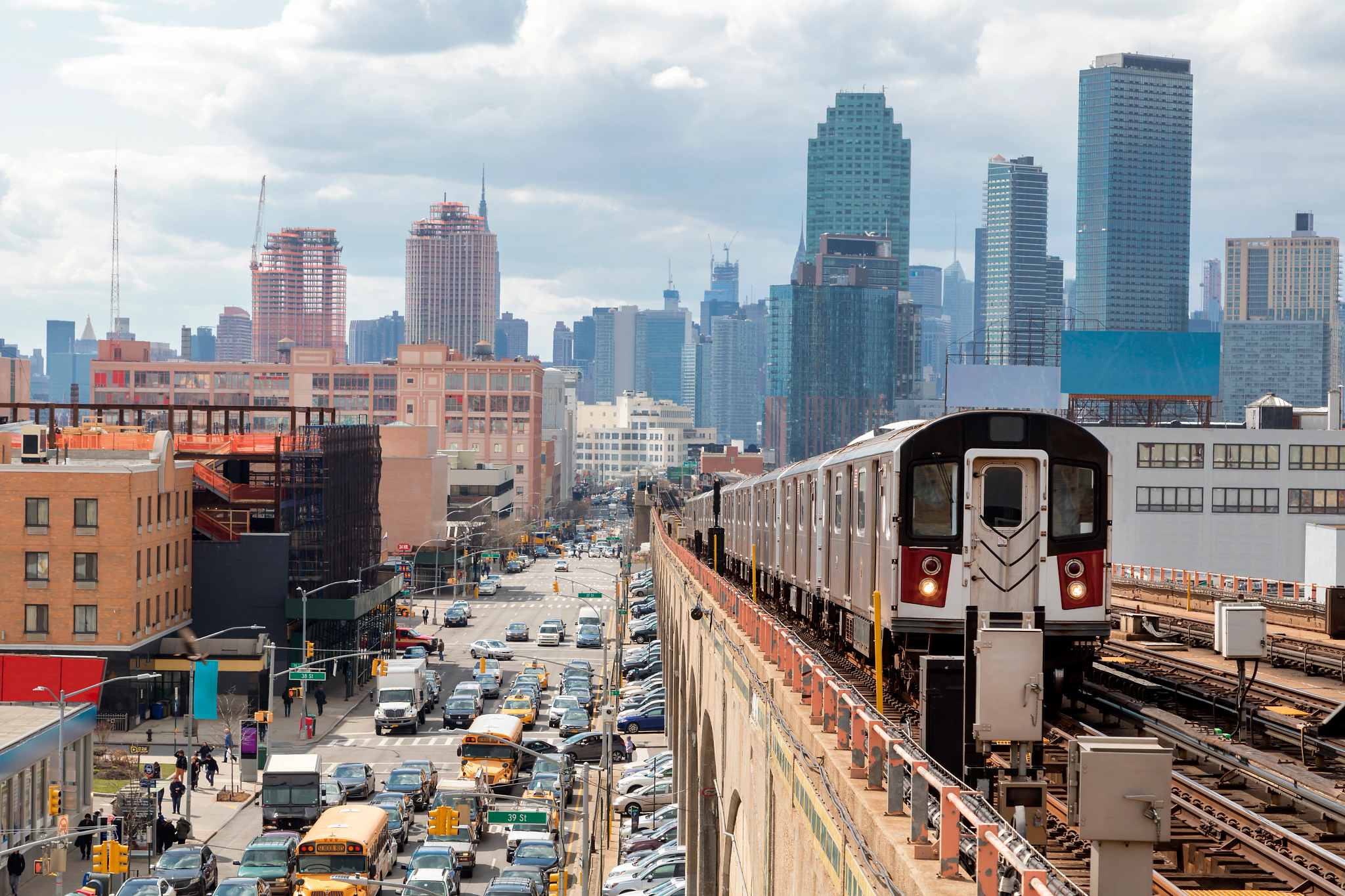 Subway Train Approaching  Elevated Subway Station in Queens, New York