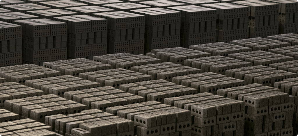  Numerous stacked boxes are visible, creating a towering display of different dimensions and colors..
