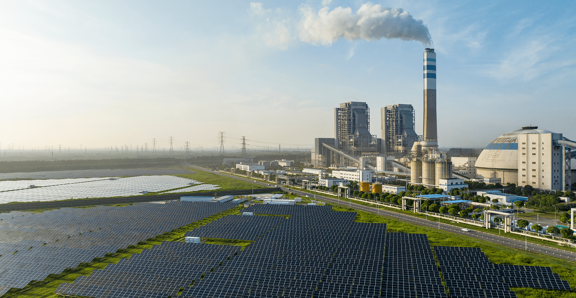 Solar power plant with extensive arrays of solar panels, contributing to renewable energy production.