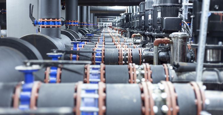 Pipes and valves in a vast industrial building, facilitating the smooth flow of fluids and controlling various processes.