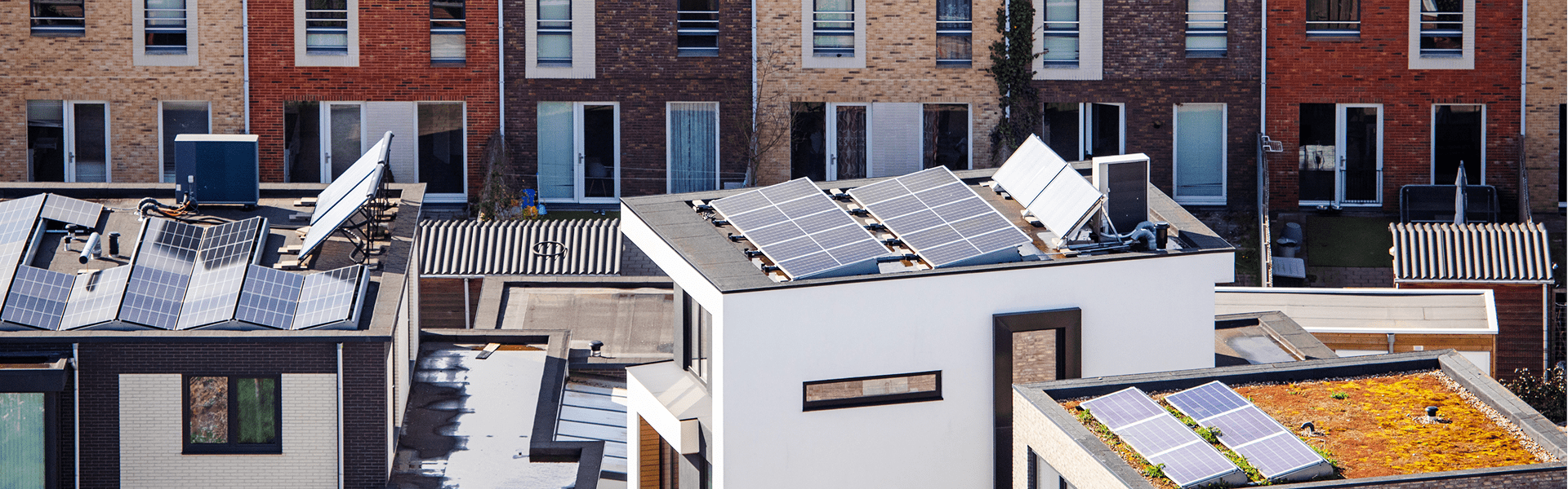 A rooftop featuring solar panels, showcasing a sustainable energy solution in an urban environment.