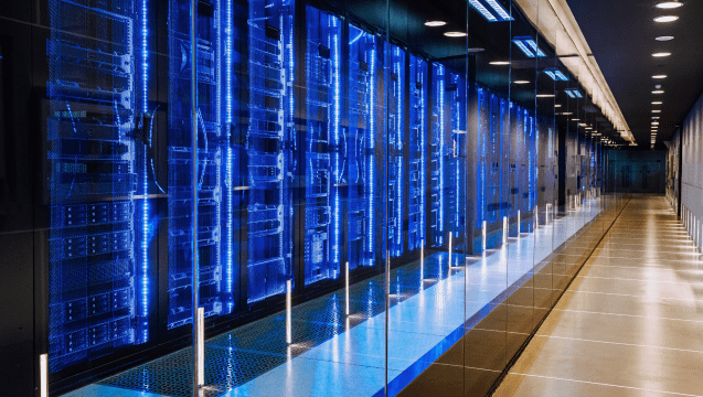 A long hallway with rows of servers in a data center, providing secure storage and processing capabilities.