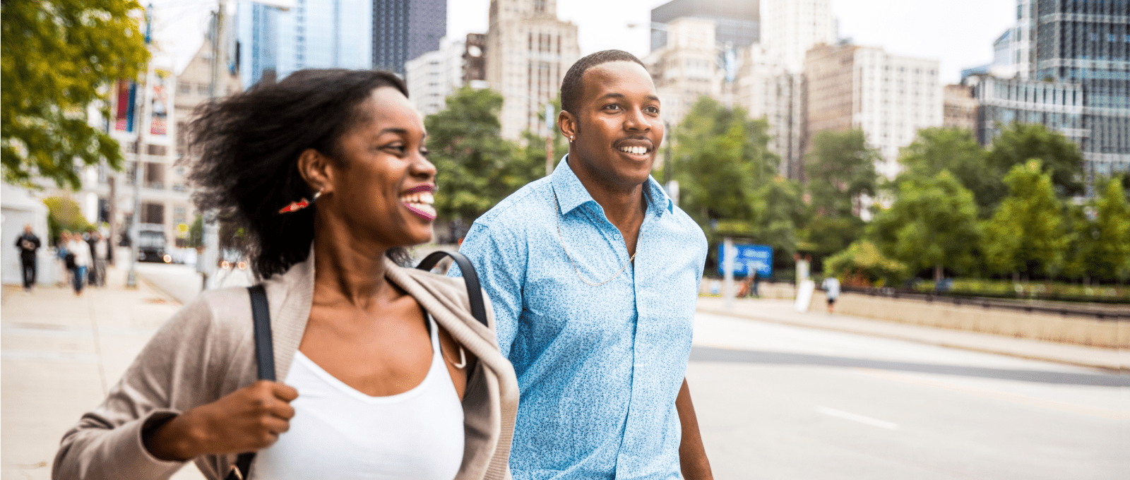 A couple walks together along in Chicago.