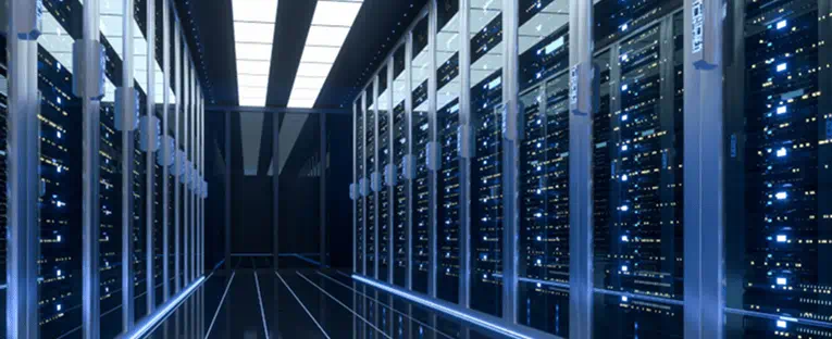 A spacious hallway featuring multiple rows of servers, illustrating a high-tech data storage facility.