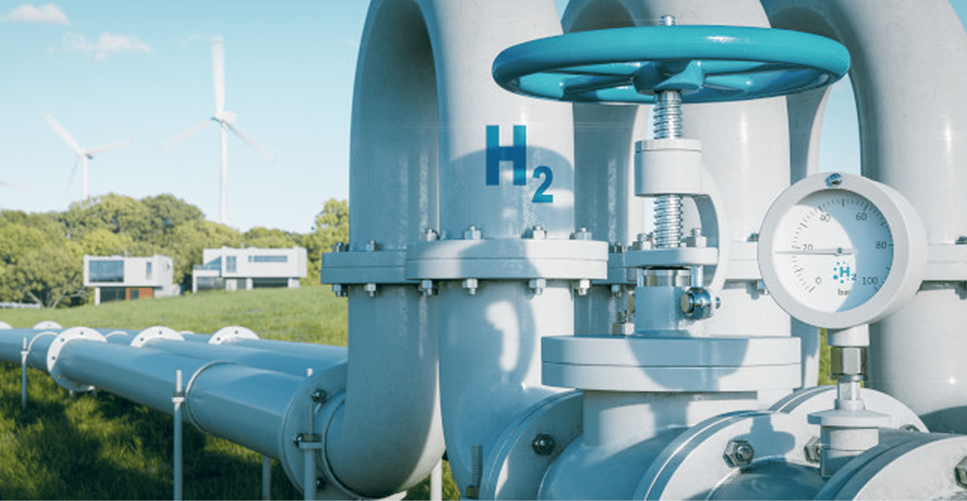 Close-up of pipes and valves with several wind turbines standing tall in the background under a blue sky.