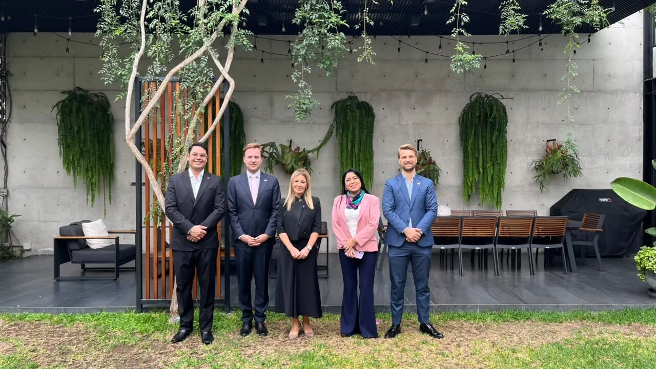 Sustainable mining partnership team photo outdoors.
