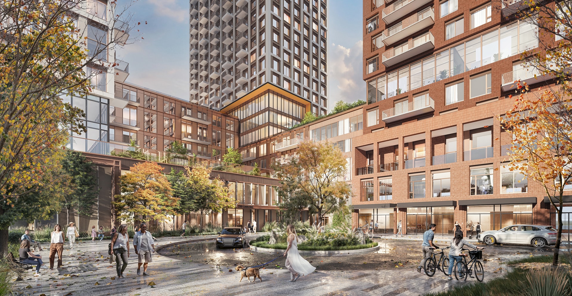 Architectural rendering of a modern mixed‑use development with mid-rise and high-rise buildings, landscaped trees, a circular driveway, and people walking, biking, and interacting in the outdoor plaza.