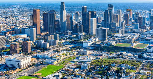 Aerial view of downtown Los Angeles, California, showcasing the city's skyline and urban landscape from above.