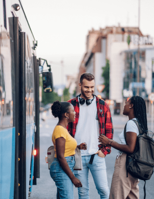 Group of young people waiting in front of a hydrogen fuel cell bus